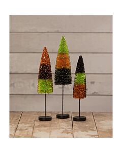The "Tricks and Treats" Halloween Trees set features three bottle brush trees in classic Halloween colors, each mounted on a wooden base. This charming trio adds a festive touch to your Halloween decor with their easy-to-use design and vibrant hues.