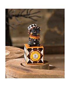 Top Hat Kitty on Block by Bethany Lowe features a charming hand-painted resin kitten wearing a festive top hat. The kitten sits atop a decorative block adorned with printed paper, crepe paper, and tinsel, perfect for adding a playful touch to your Hallowe
