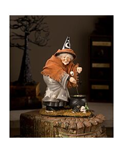 Figurine by Bethany Lowe featuring a Halloween witch with wispy grey hair and distressed orange gauze. Crafted from hand-painted resin, gauze, wire, and natural moss.
