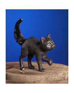 Scaredy Cat is a small hand-painted resin figure featuring a cat with a worried expression, adorned with chenille for added texture. This vintage-inspired Halloween decoration adds a touch of whimsy to your seasonal decor.