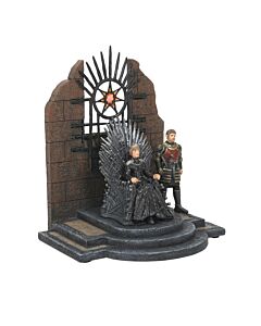 Miniature figures of Cersei and Jaime Lannister from Game of Thrones, posed in formal attire with regal expressions, symbolizing their powerful and complex relationship.