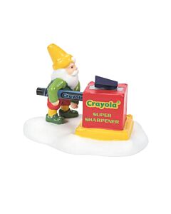 A cheerful Crayola elf stands ready with a giant crayon sharpener, ensuring every crayon is perfectly pointed for creative adventures. This vibrant accessory brings a touch of whimsy to any festive display.