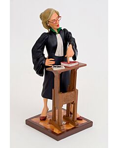 A confident female lawyer figurine dressed in professional attire,, symbolizing justice and determination inspired by a lifelong fight against injustice.