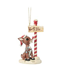 Rudolph by North Pole Sign