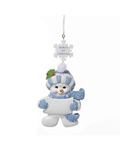 This darling snow baby boy ornament marks the joy of a little one’s very first Christmas. Bundled in a cozy hat and scarf, she holds a blank banner ready to be personalized with a name or date.