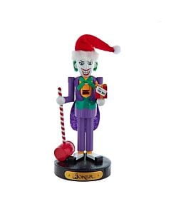 A mischievous DC Comics Joker nutcracker stands ready for holiday chaos, sporting his signature green hair, purple waistcoat, and that iconic devilish grin. This wickedly whimsical holiday figure transforms the traditional nutcracker into Gotham's most no