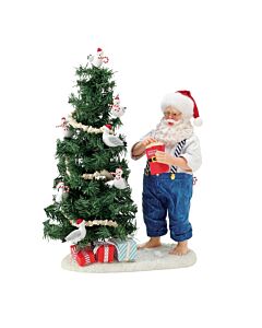 Embrace the whimsical texture of a modern flocked tree, reminiscent of classic German craftsmanship and coastal charm. Popcorn accents add a playful detail to this collectible, capturing the magic of a holiday scene.