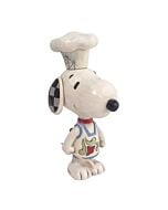 This Jim Shore figurine shows Snoopy dressed as a cheerful chef, complete with a hat and apron, ready to whip up something delicious. Hand-painted with folk art charm, it celebrates his playful personality and love of culinary fun.