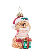 Christopher Radko 'Festive Furry Friend Gem' ornament showcases a cheerful pup dressed as Santa's helper, complete with its own holiday list. This charming glass ornament adds a playful and heartwarming touch to your Christmas tree.