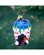 Christopher Radko 'A Lotta Help from My Friends Gem' ornament features three cheerful penguins presenting a round design decorated with a snowy scene of Santa flying through the night sky. This glass ornament brings a whimsical and festive charm to your h