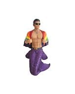 The Pride Figurine features a vibrant merman with shimmering purple fins, proudly draped in a colorful Pride flag. This December Diamonds collectible celebrates inclusivity and festive elegance with a playful, ocean-inspired design.