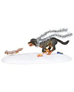 Department 56’s Snots on the Run accessory captures Cousin Eddie’s mischievous Rottweiler causing chaos in the front yard. With playful detail, this piece adds humor and lively action to any Christmas Vacation Snow Village display.