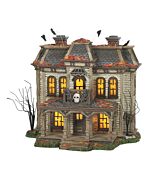 A haunted-style mansion adorned with bats and autumn leaves, glowing with eerie light and perfect for setting the scene in a Halloween village.