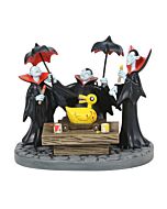 A spooky village accessory depicting the Vampire Brothers from The Nightmare Before Christmas as they mischievously ready a creepy toy duck.