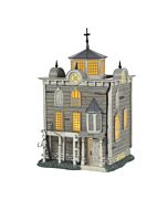 Darkly whimsical model of Uncle Fester's quirky, offbeat home with crooked architecture and spooky charm, fitting perfectly in a haunted village display.