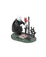Miniature of Uncle Fester experimenting in the garden with a bizarre contraption, blending mad science with horticulture.