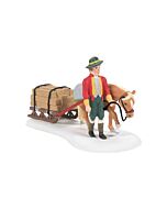 Miniature village accessory featuring a Bavarian craftsman guiding a horse-drawn sled loaded with timbers, on his way to deliver supplies to the local clock shop.