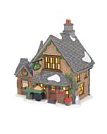 The "Cotswold Greengrocer" captures the charm of a rural market with its quaint design, reflecting the pastoral beauty of the Cotswolds region. This detailed village accessory highlights the traditional role of greengrocers in charming British and Austral