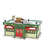 A retro-style bowling alley decorated for winter, featuring cheerful details that evoke the fun of Charlie Brown and friends enjoying a game together.