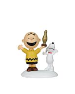 Charlie Brown celebrates a bowling milestone with Linus and Snoopy in a joyful winter scene from the Peanuts village collection.