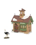 Brick gatehouse entrance to the Zoological Gardens from Dickens' Village, accompanied by a standing ostrich figurine