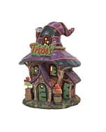 Whimsical Halloween-themed candy shop with spooky decorations, featuring playful signage for sweets and mischievous tricks like squirting frogs and stink bombs.