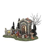 A haunted cemetery scene with weathered tombstones and spooky landscaping, suggesting ghostly happenings on Halloween night.