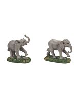 Two elephant figurines, representing majestic residents of the Dickens' Village Zoological Gardens.
