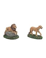 Pair of lion figurines, one male and one female, displayed as residents of the Dickens' Village Zoological Gardens.