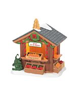 Wooden market stall filled with an array of colorful fruits, evoking a 19th-century holiday marketplace scene.