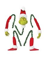 The Grinch cinches himself into a Christmas tree, clasping limbs and a dangling bauble on a hooked left hand while his stitched grin mischievously surveys the scene. This handmade Possible Dreams collectible evokes cozy, nostalgic holiday traditions.
