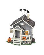 A spooky Halloween shack glowing with eerie charm, surrounded by grinning Jack-o'-lanterns and fluttering bats. The detailed wooden structure features mystical crystals and a 'Keep Out' sign, perfect for a magical—or haunted—village scene. Lights up for a