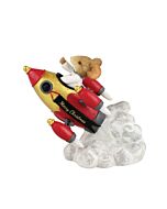 A whimsical mouse astronaut soars on a golden rocket, inspired by FAO Schwarz. With iconic red and gold accents, this figurine blends Christmas magic with a galactic adventure, capturing the spirit of wonder and holiday cheer.