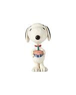 This charming Jim Shore figurine features Snoopy joyfully presenting a cupcake topped with a birthday candle. Handcrafted with delicate folk art details, it makes a delightful celebration of birthdays and special moments.