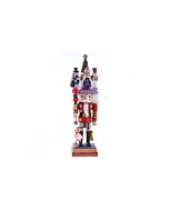 A sparkling Kurt Adler Hollywood Nutcracker designed by Holly Adler, featuring a festive glittered outfit and a Christmas tree hat. This whimsical collectible captures the magic of the Nutcracker Suite, with Clara at his feet and a glittered heart-topped