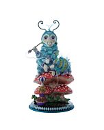 A whimsical Caterpillar nutcracker inspired by classic storytelling, featuring vibrant colors, intricate facial details, and a playful design that brings the character to life. Perfect for adding a touch of fantasy to holiday décor.