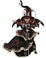 A finely crafted Mark Roberts Wayward Witch, dressed in flowing black robes, captures an enchanting blend of mystery and elegance. This lifelike figurine radiates dark sophistication, perfect for adding an heirloom-quality charm to any collection.