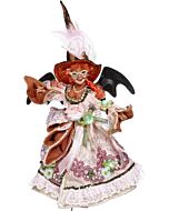 A whimsically dressed witch in rich, ornate fabrics and a pointed hat, holding a broomstick as she looks mischievously ahead. Her elaborate costume features detailed patterns and vibrant autumn colors, embodying magical charm and playful mischief.