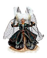 A finely dressed witch from Mark Roberts' Midnight Hour collection enchants with intricate fabric details and jeweled accents, embodying a magical midnight elegance. Her poised stance and elaborate costume capture the whimsy and mystery of a fanciful Hall