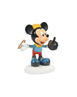 Mickey Mouse stands cheerfully with a pen in hand, ready to autograph a classic Mickey Ears hat for fans.