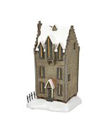 Miniature model of the eerie Shrieking Shack, featuring weathered walls and a crooked roof, evoking the haunted legend that surrounds this mysterious Hogsmeade structure.